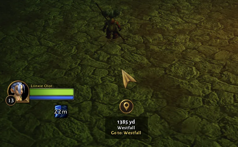 The guide arrow on screen next to a level 13 gnome mage, pointing the way, with a map pin marker under it that reads 1385 yd, Westfall, Go to: Westfall.